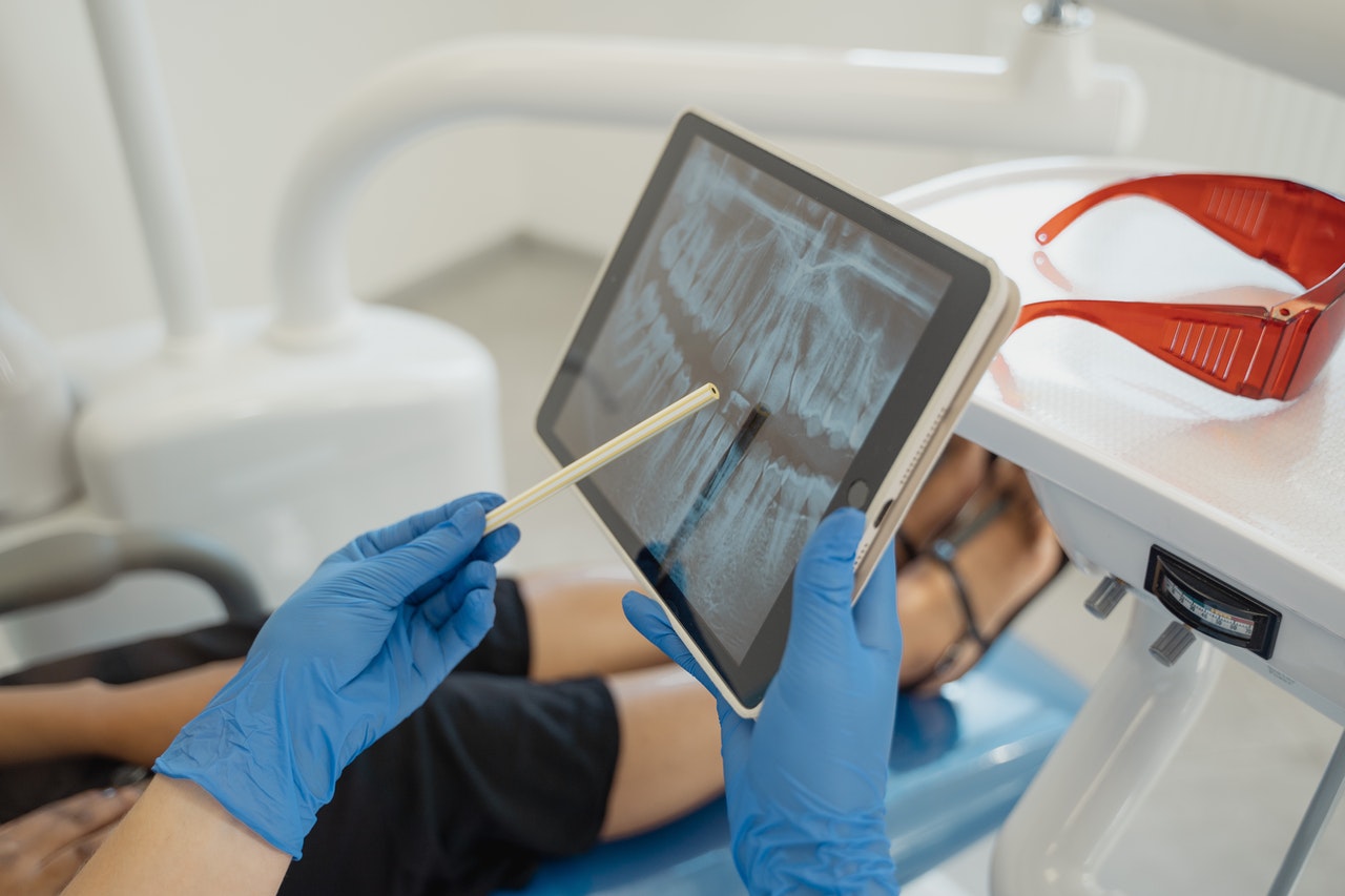 dentist holding ipad